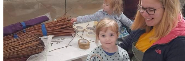 Mums and children making with willow